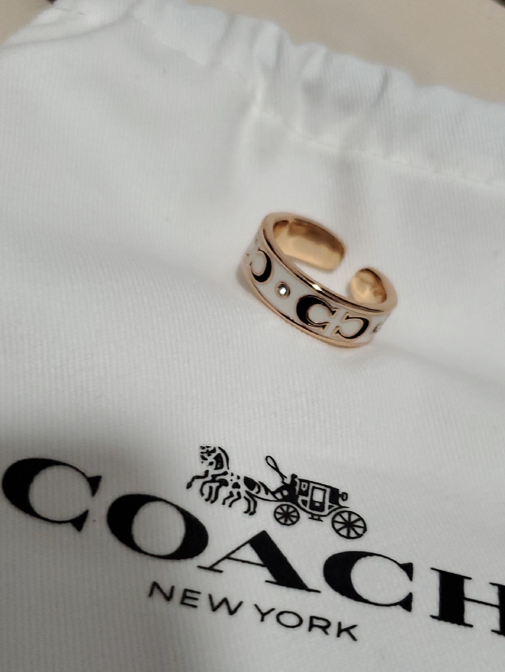 Coach Gold-Tone White and Black Enamel Open Band Ring Fit Flexibility